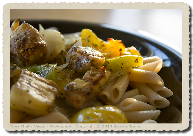 Penne pasta with baked eggplant and green peppers.
