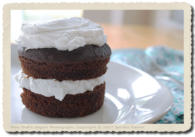 a small chocolate cake with coconut cream.