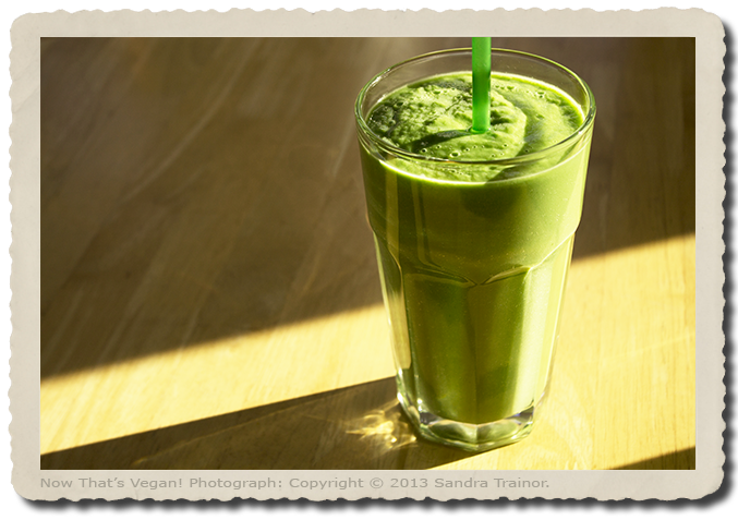 A bright green, thick and creamy, romaine lettuce, avocado, celery, and pineapple shake.
